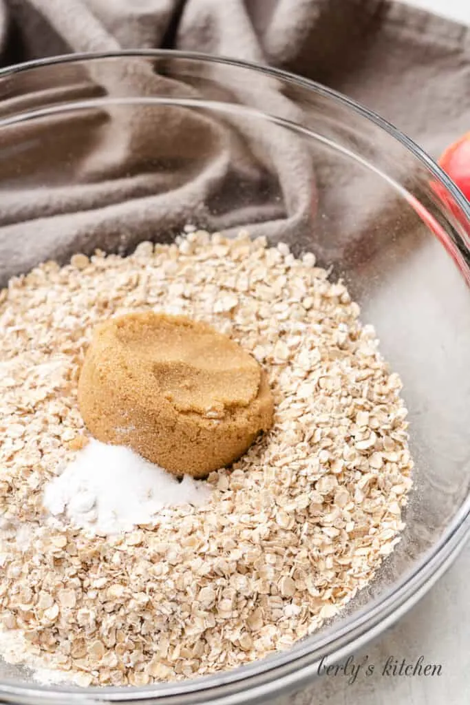 Flour, oats, and brown sugar in a mixing bowl.