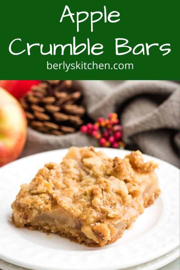 A fresh baked apple crumble bar on a plate.