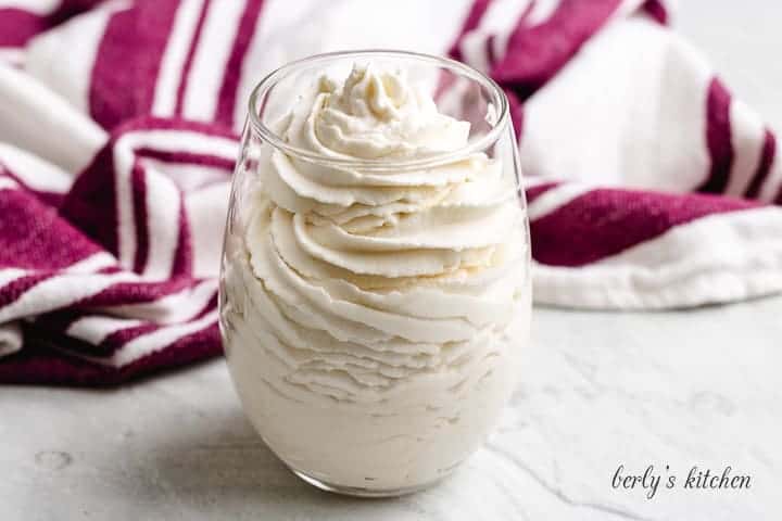 The finished bourbon whipped cream in a glass.