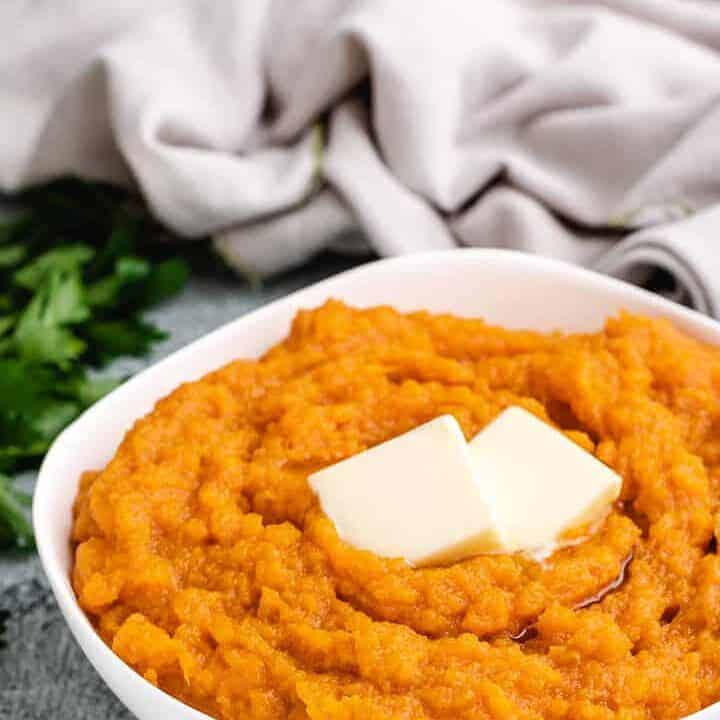 Instant Pot Mashed Sweet Potatoes Pressure cooker mashed sweet potatoes with two pats of butter.