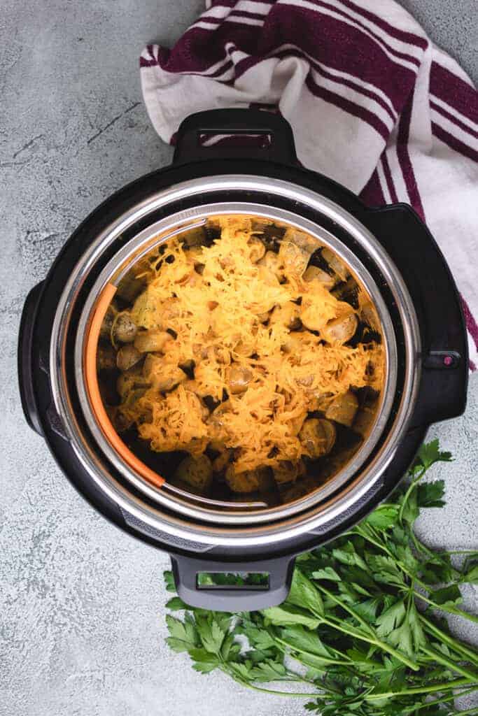 Shredded cheddar sprinkled over the hot potatoes.