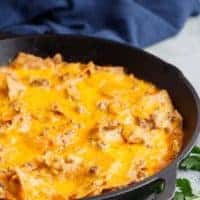 Cheesy Tex-Mex casserole in a pan.
