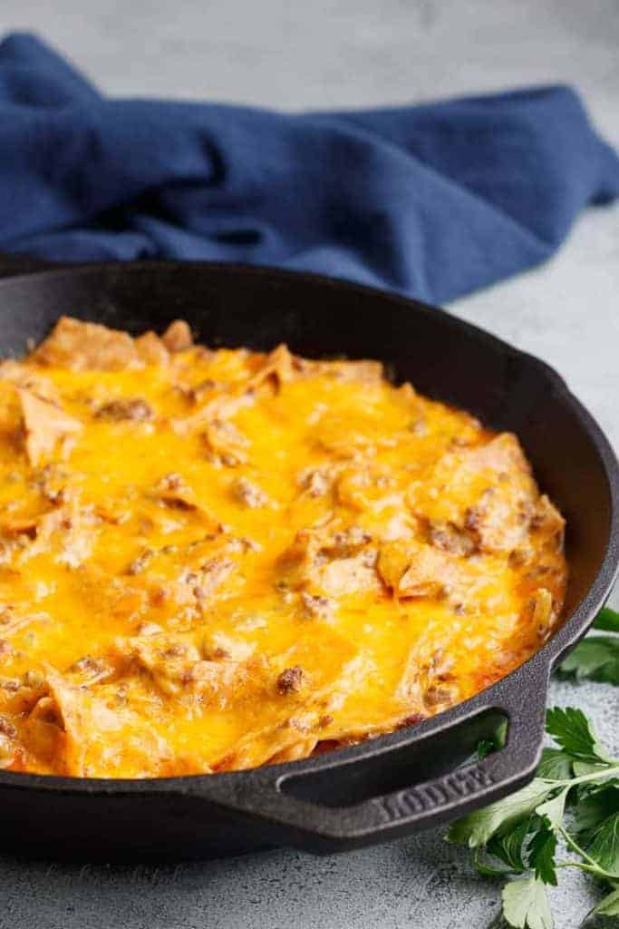 Cheesy tex-mex casserole in a pan.