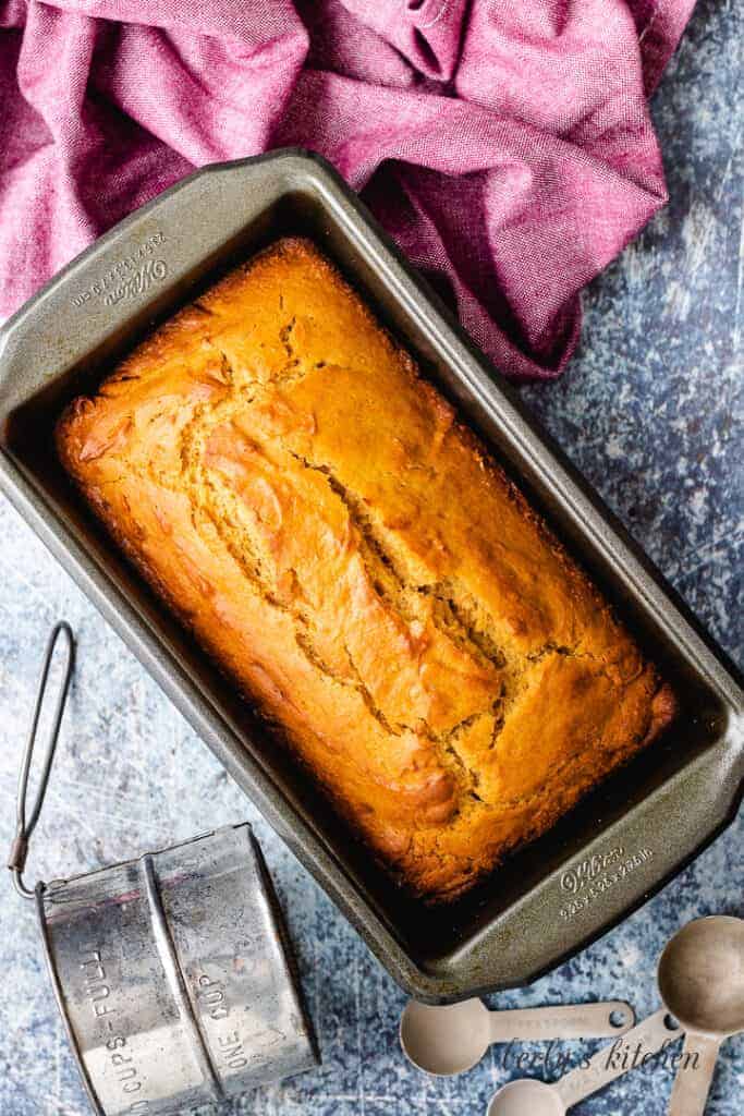 Top-down view of the baked bread in the loaf pan.