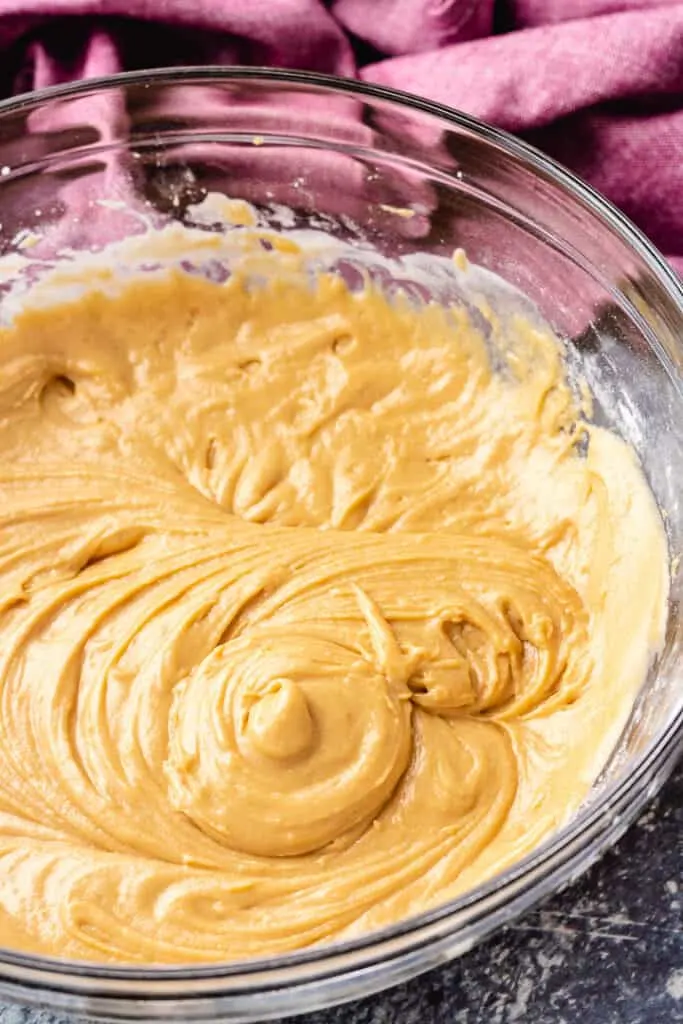The peanut butter batter is mixed in the large bowl.