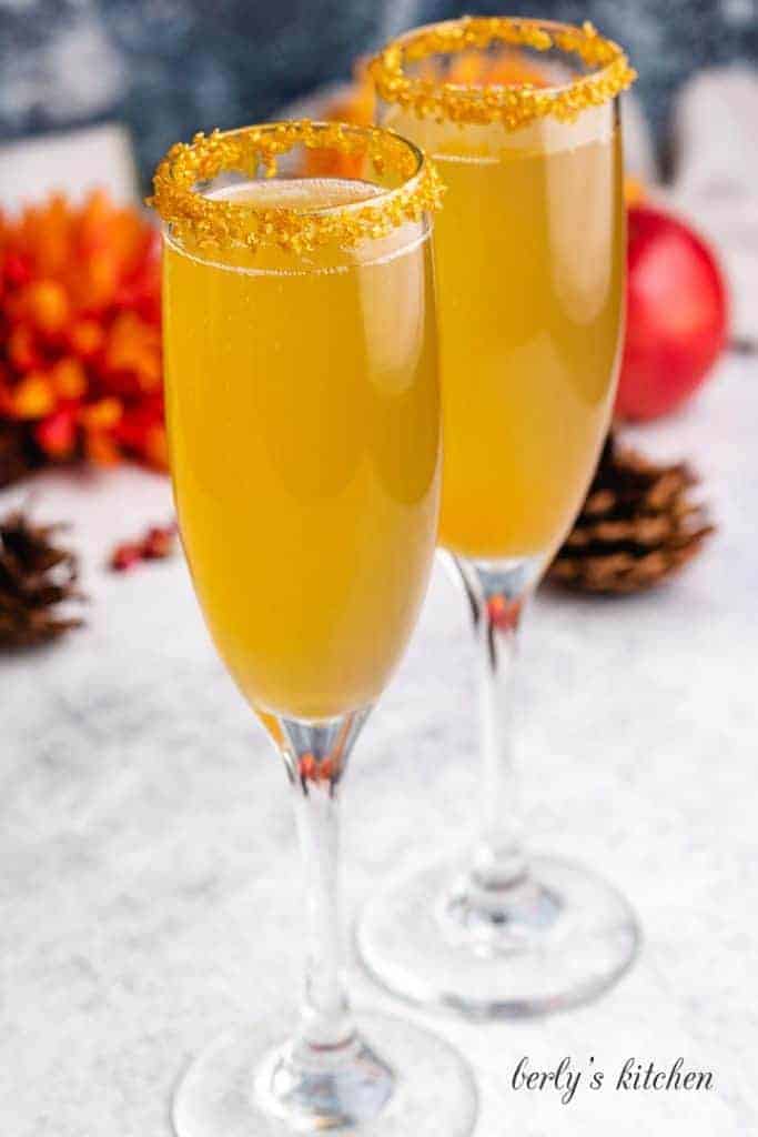 The finished mimosas in champagne glasses.