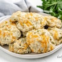 Cheddar dill biscuits served on a plate.
