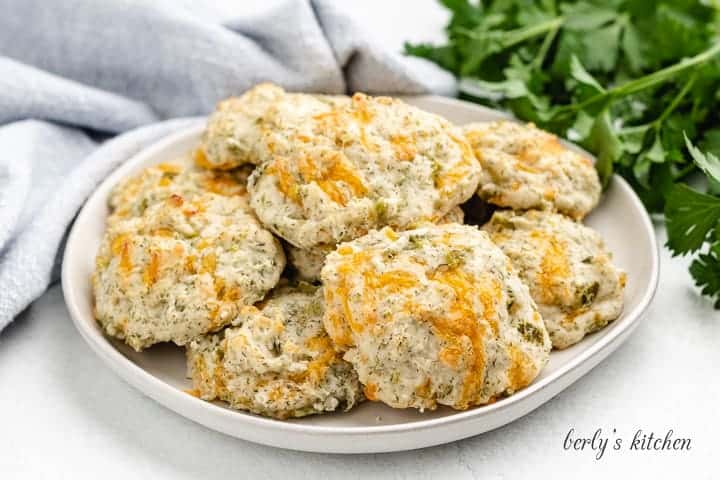 Cheddar dill biscuits served on a plate.