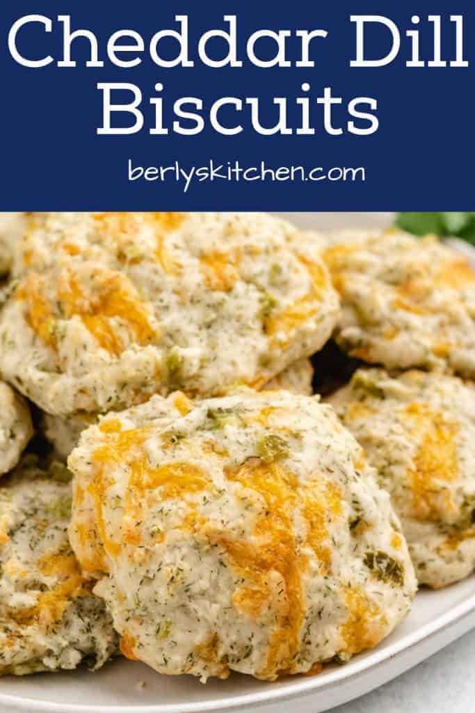 Up-close view of the cheddar dill biscuits on a plate.