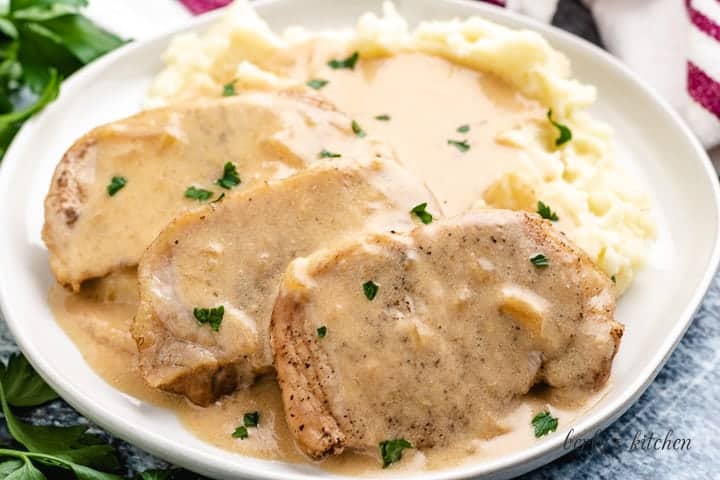 Up-close view of the instant pot pork chops with gravy.