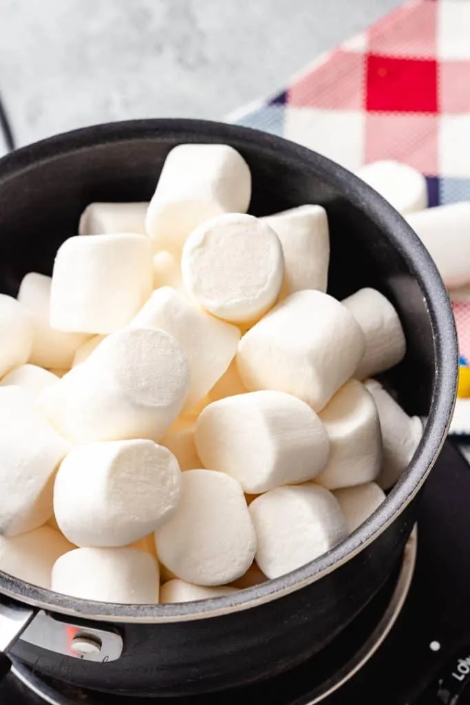 Large marshmallows in a saucepan.