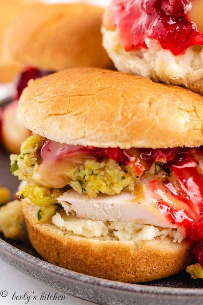 An up-close view of the thanksgiving sliders on a plate.