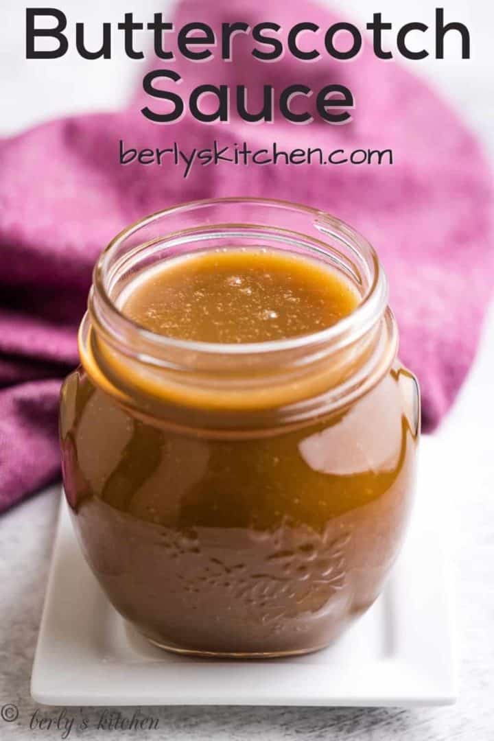 The finished butterscotch sauce stored in a mason jar.