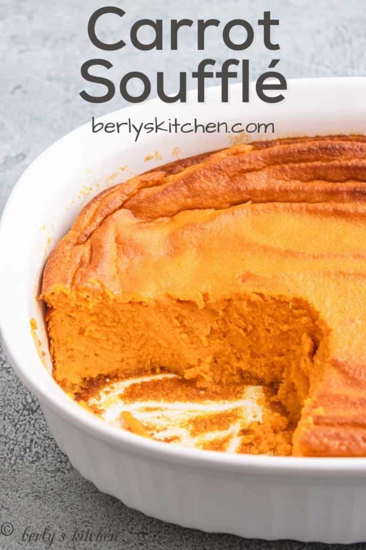 Carrot soufflé served in a white baking dish.
