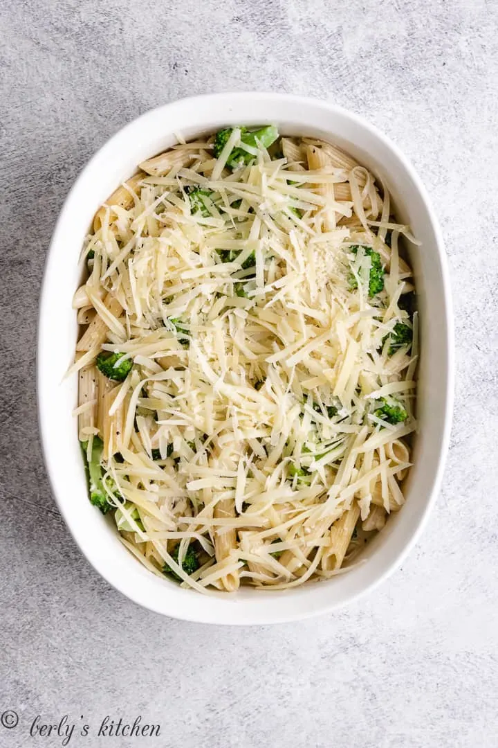 Parmesan cheese sprinkled over the unbaked casserole.