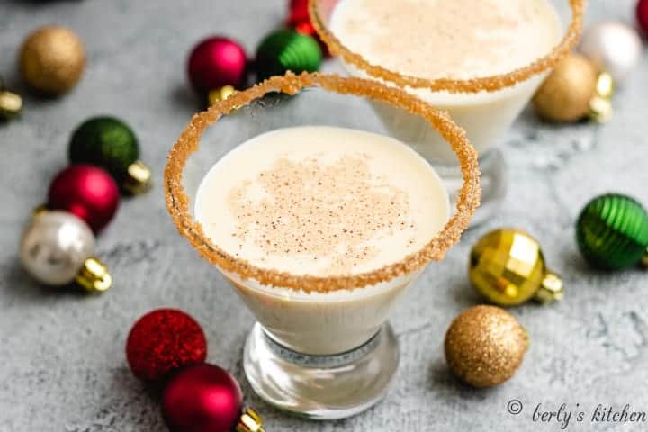 Eggnog Martini Two eggnog martinis in decorated martini glasses.