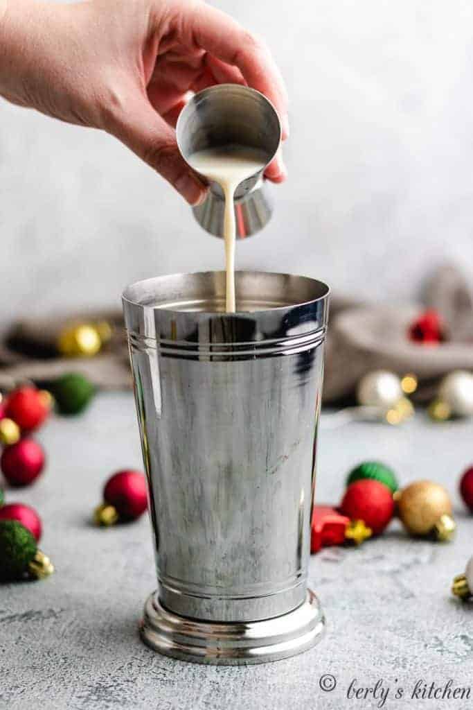 Eggnog Martini Rumchata added to the cocktail shaker.