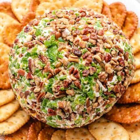 The finished jalapeno cheese ball served with crackers.