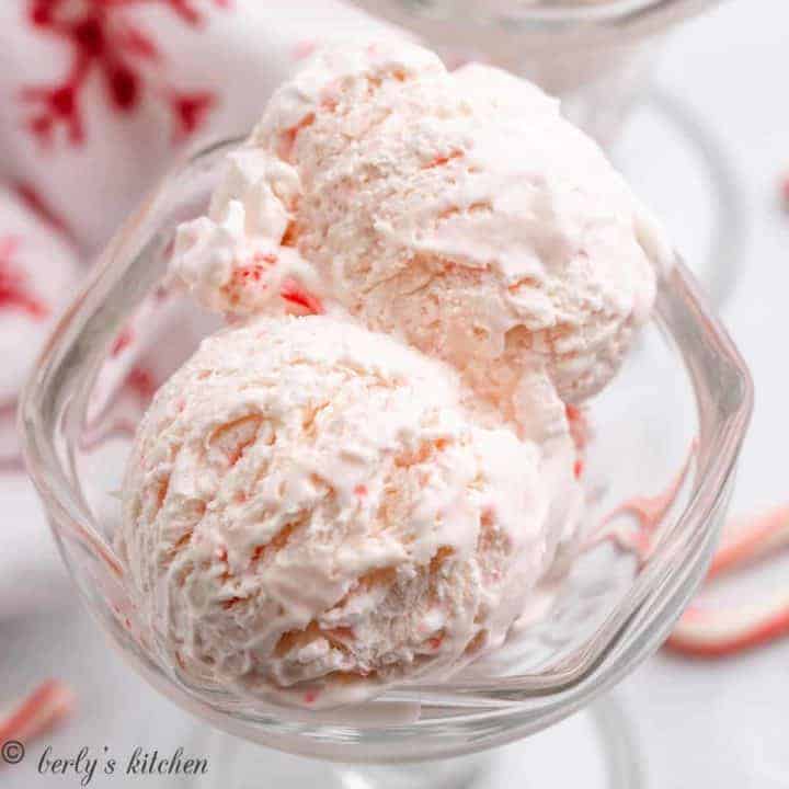 Three scoops of the peppermint ice cream in a tulip glass.