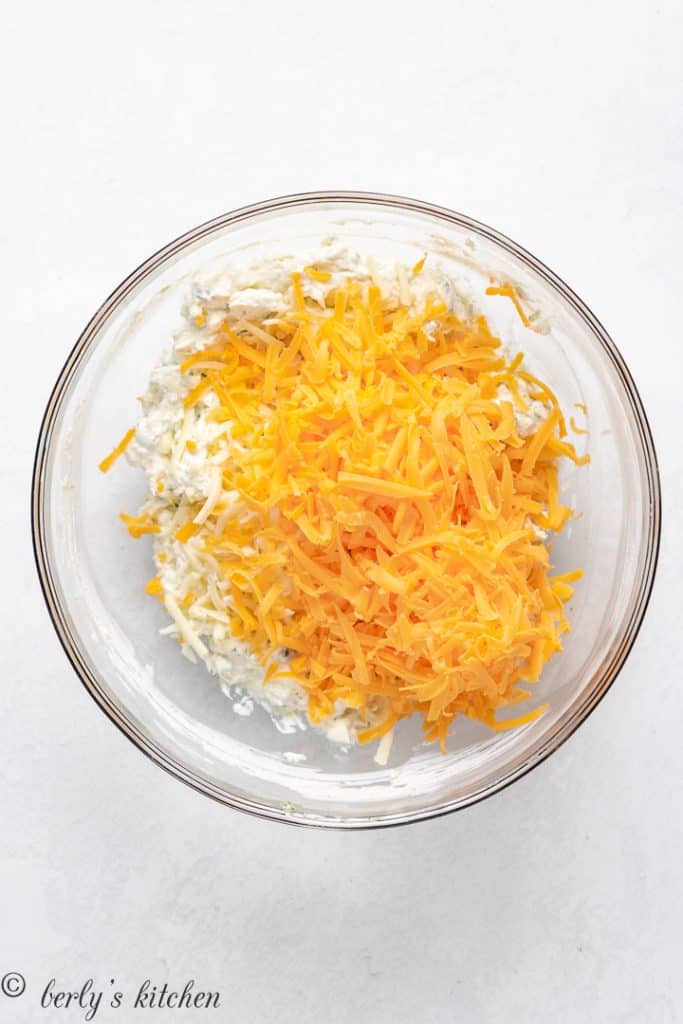 Shredded cheese added to the cream cheese mixture.