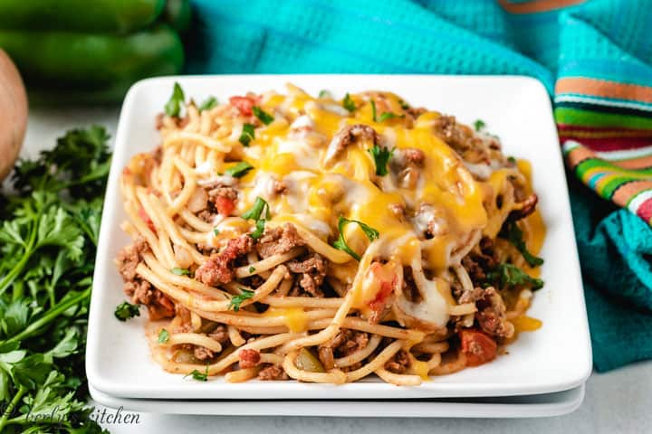 Mexican Spaghetti on white plates.