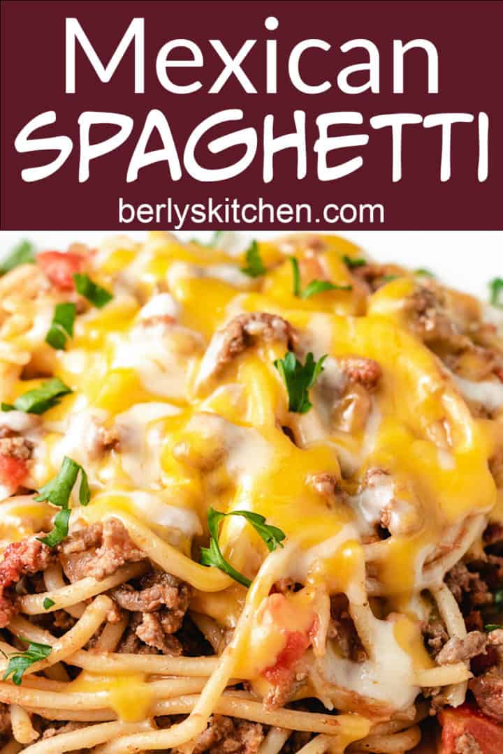 Close of up cheesy mexican spaghetti casserole.