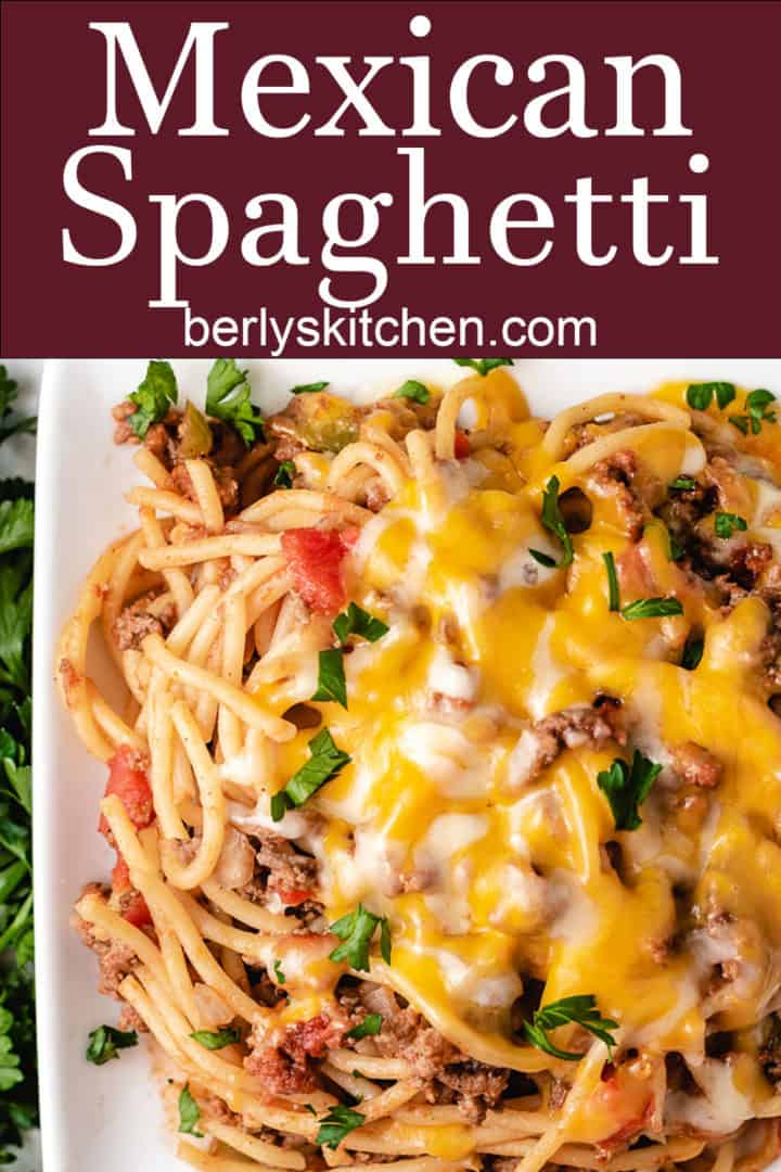 Top down viewof mexican spaghetti on a square dish.