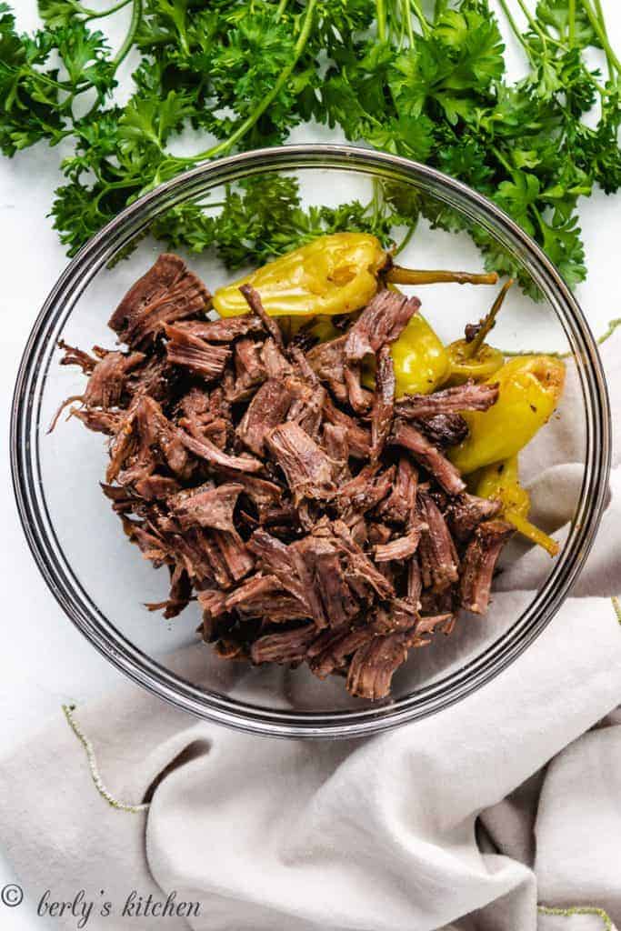 Bowl with pulled Mississippi beef roast.