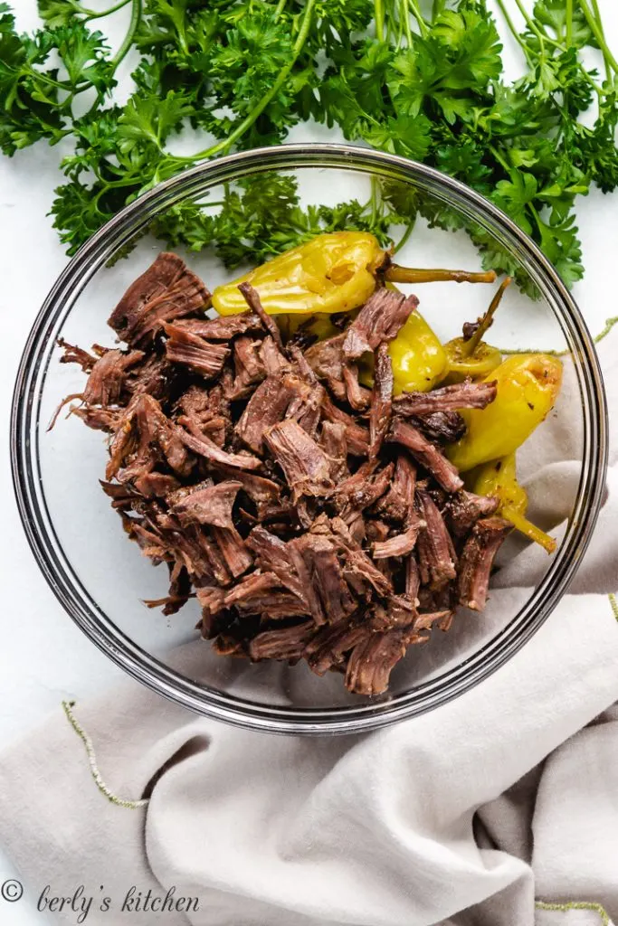 Bowl with pulled Mississippi beef roast.