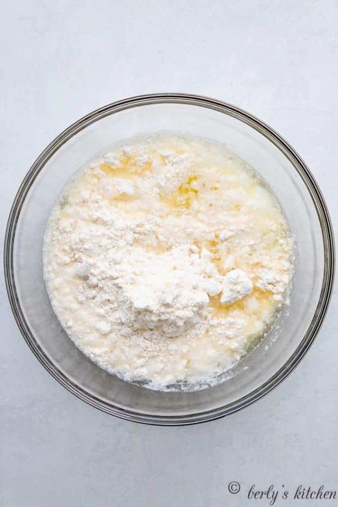 Cake mix, egg whites, and other ingredients in a mixing bowl.