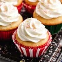 The finished candy cane cupcakes on a wire rack.