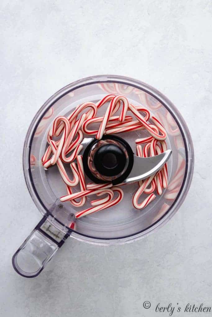 Mini candy canes in a food processor.