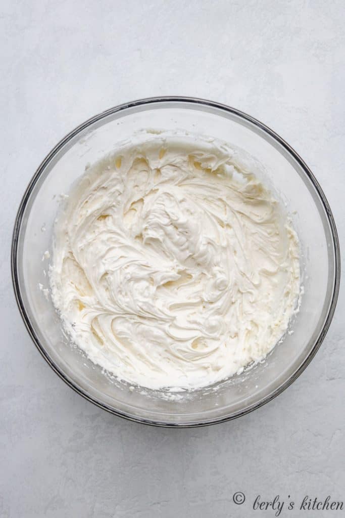The mixed peppermint frosting in a mixing bowl.