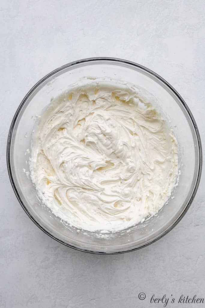 The mixed peppermint frosting in a mixing bowl.