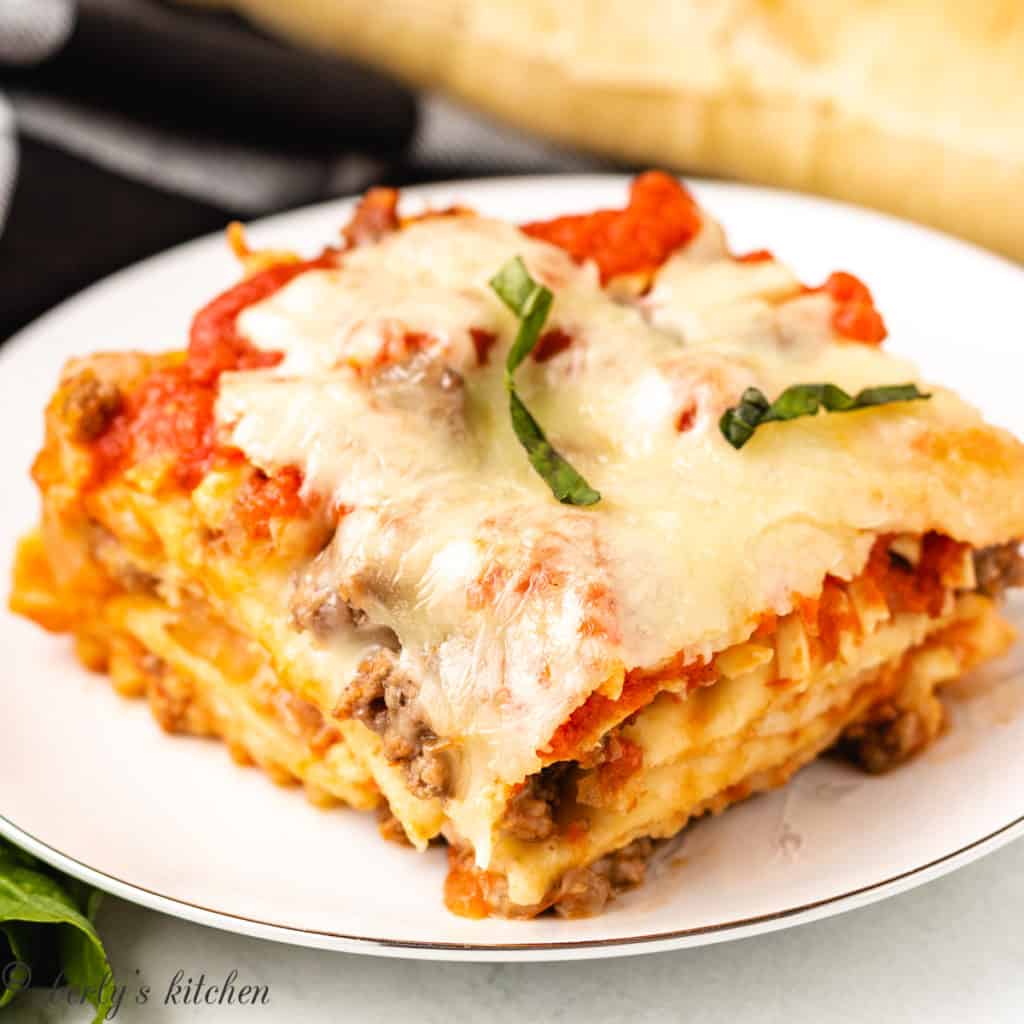 A serving of ravioli lasagna on a plate.