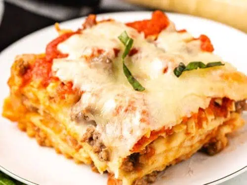 A serving of ravioli lasagna on a plate.