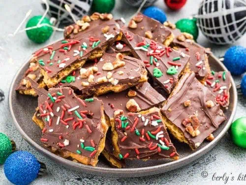 Saltine cracker candy topped with holiday sprinkles.