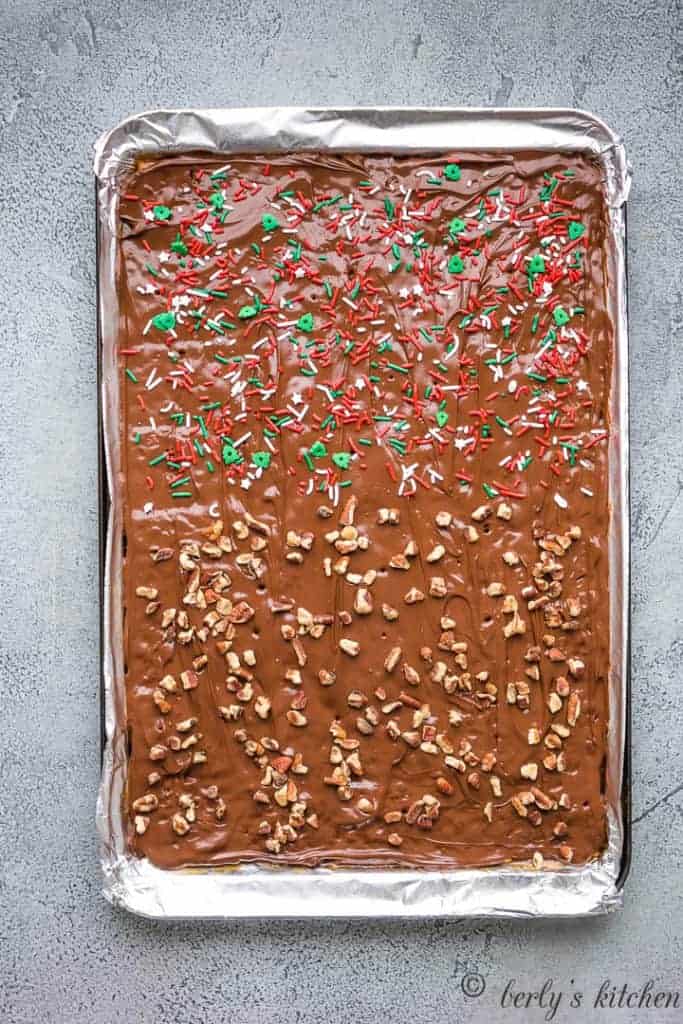 Chopped nuts and festive sprinkles added to the chocolate.