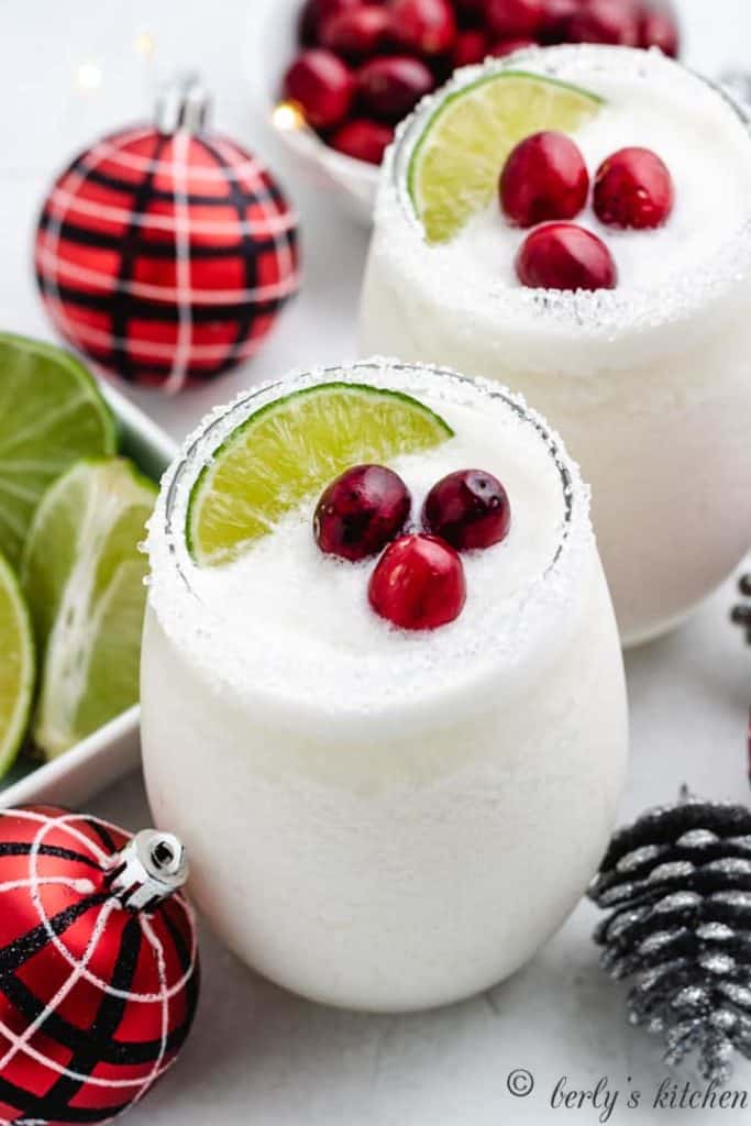 White christmas margaritas served in cocktail glasses.