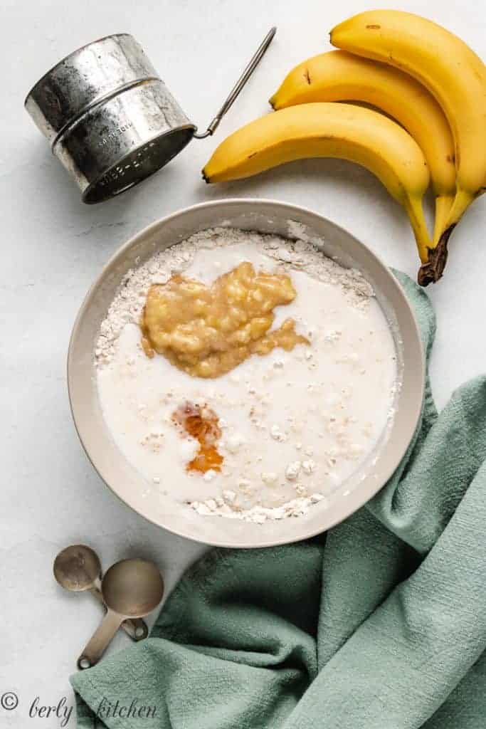 Unmixed pancake batter ingredients in a bowl.