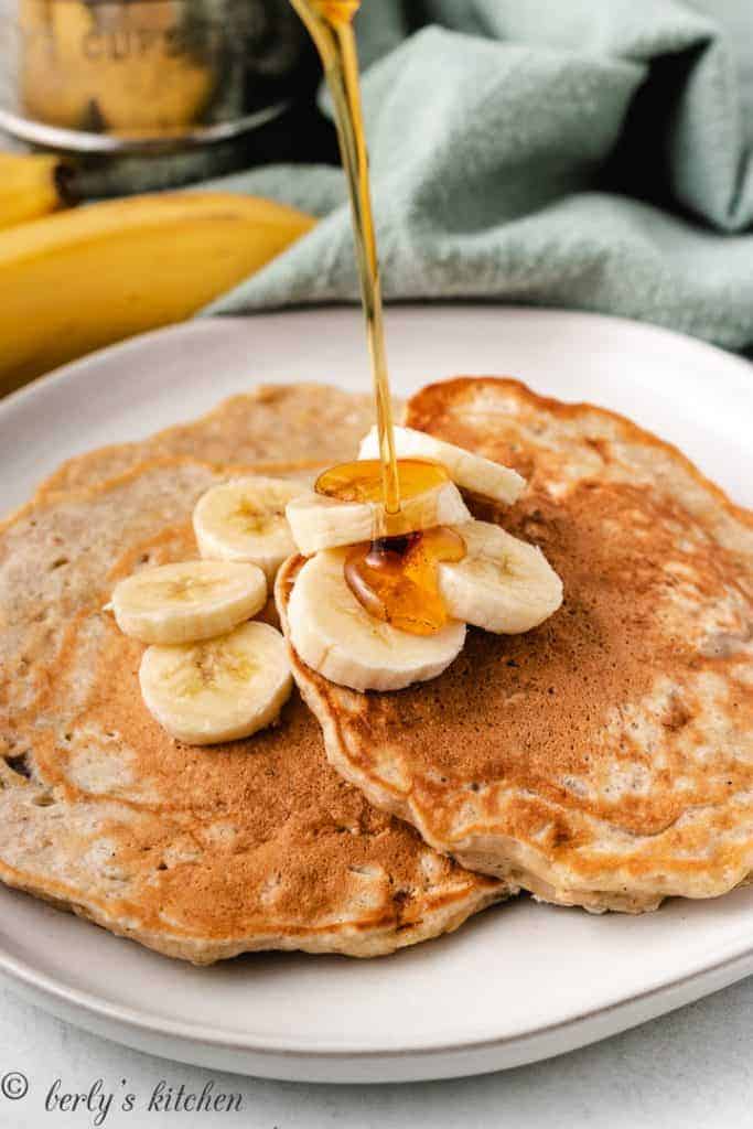 Banana oat pancakes with syrup.