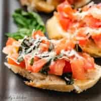 Easy tomato bruschetta with fresh basil.