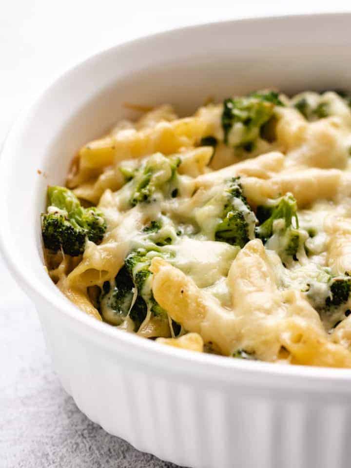 Broccoli cheese pasta bake in a casserole dish.