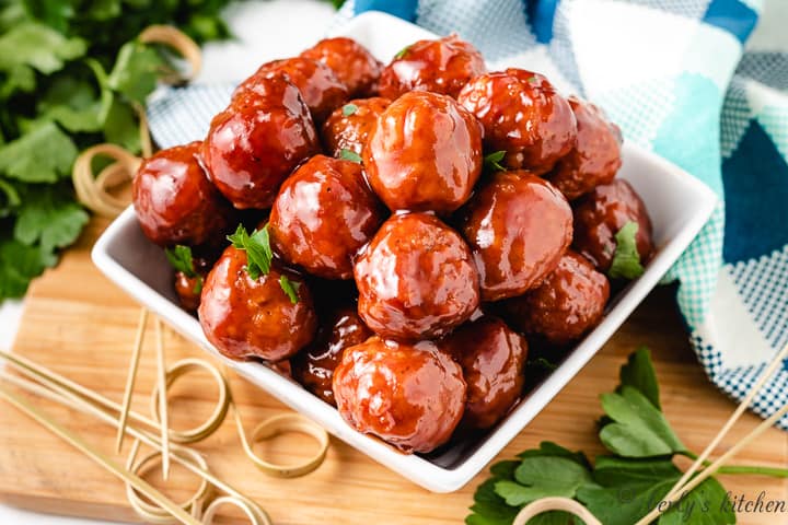 Crockpot bbq meatballs in a square dish.