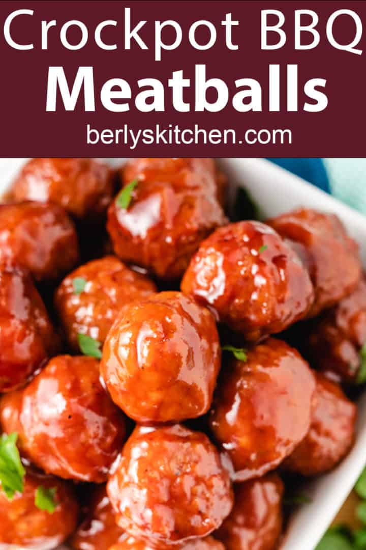 Close up of meatballs with bbq sauce in a dish.