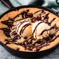 Mini Skillet Cookie with ice cream and chocolate syrup.