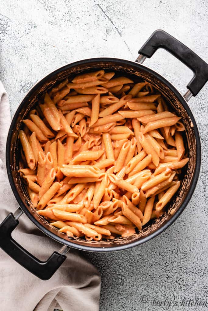 Top down view of penne alla vodka in a pan.