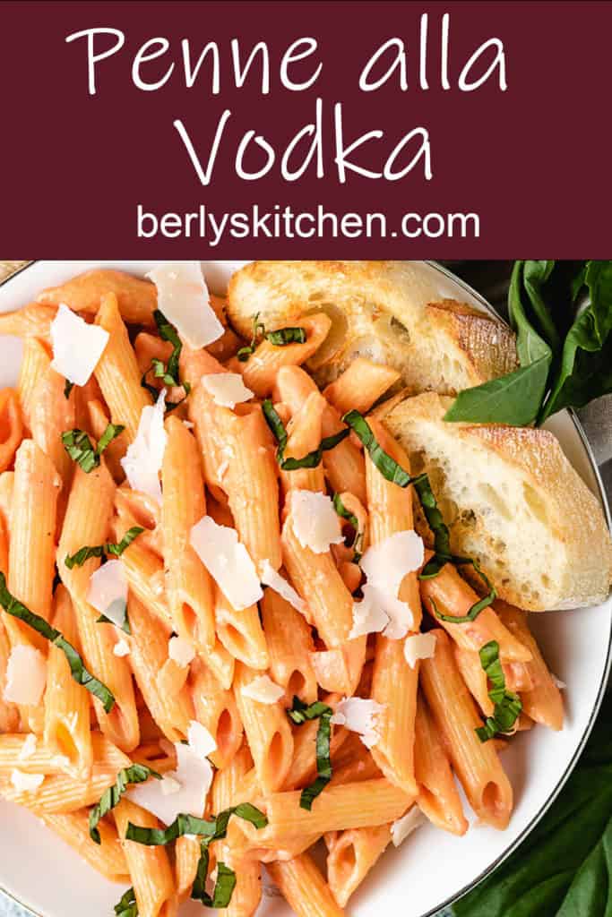 Penne noodles with pasta sauce, parmesan, and fresh basil.