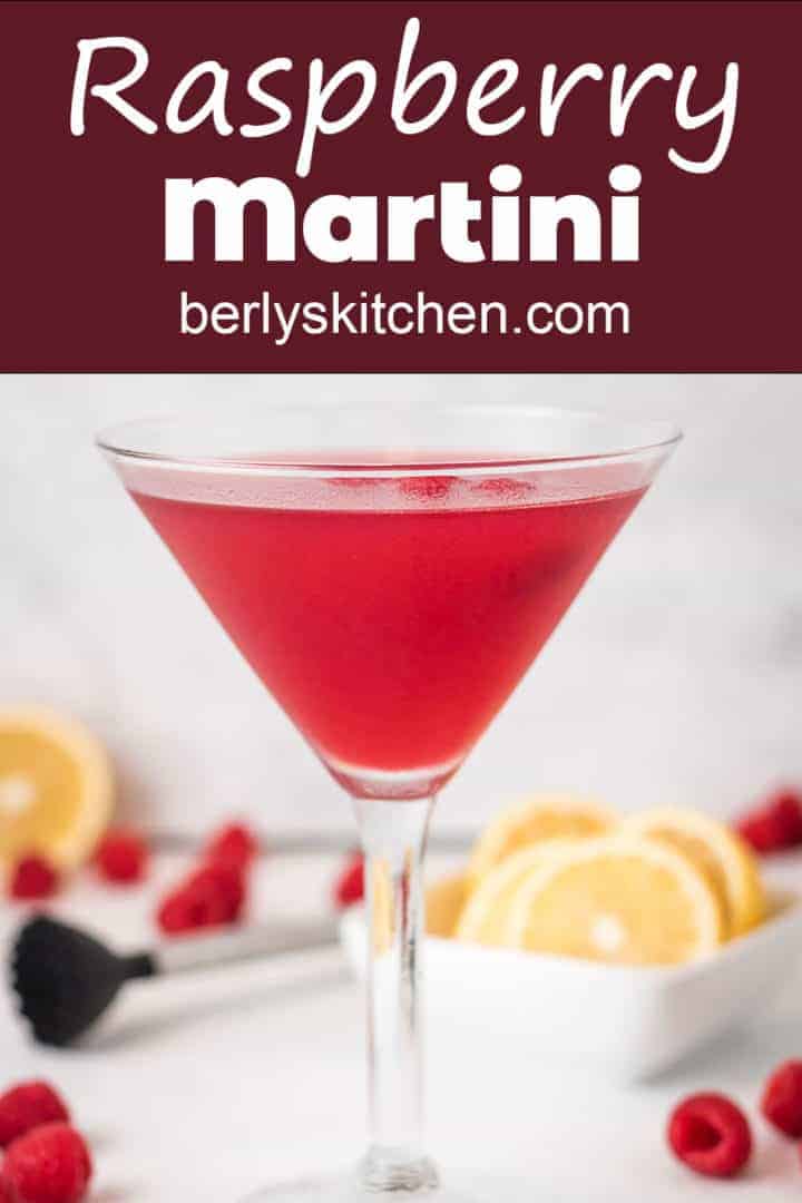 Raspberry martini with fresh lemons and raspberries.