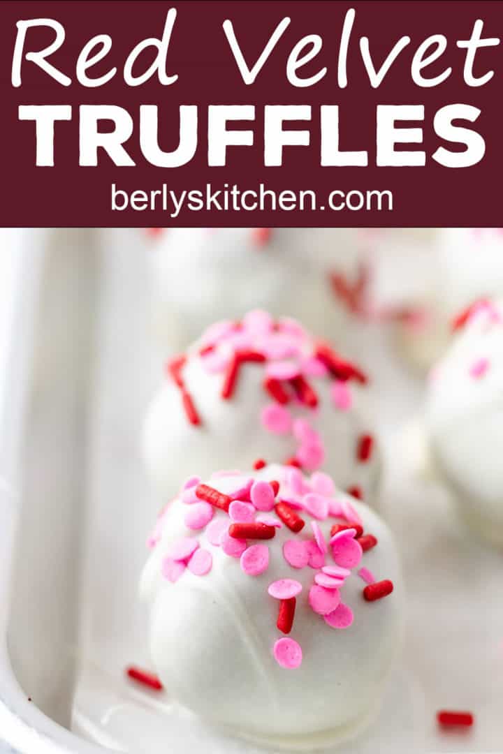 Valentine's day truffles on a baking sheet.